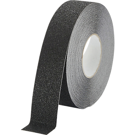 Black and gray non-slip adhesive tape on a roll. Top with granular texture to prevent slipping. Roll of tape on white background.