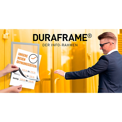 Man in sunglasses opens a door. Beside it: Duraframe info stand with "Our new opening hours".