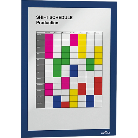 Shift schedule with colored fields in a blue frame. Title: SHIFT SCHEDULE Production. Months and days are listed in a table.