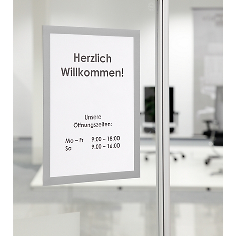 Sign saying "Welcome!". Opening hours below: Mon-Fri 9:00-18:00, Sat 9:00-16:00.