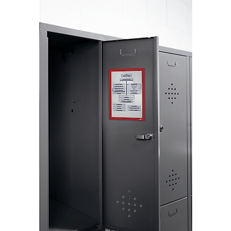 A gray cabinet with its door open. On the inside of the door is an information sheet with a red frame. The structure of the sheet is shown on the sheet.