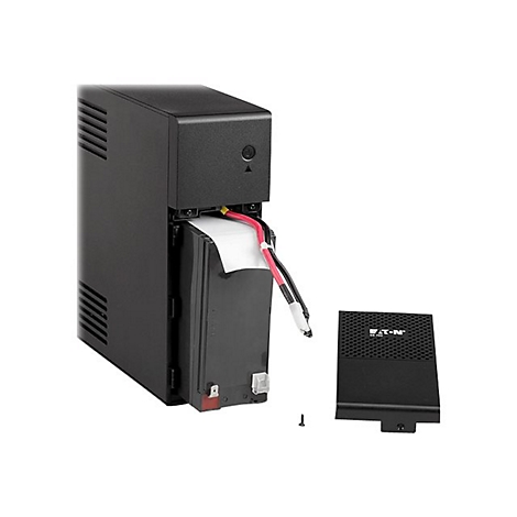 Un onduleur noir avec le couvercle de la batterie retiré, révélant une batterie. Le logo Eaton est visible.