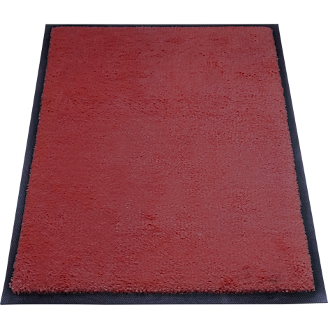 Rechthoekig rood tapijt met zwarte rand. Het oppervlak is zacht en getextureerd.