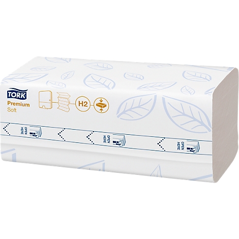 Witte Tork papieren handdoekverpakking, blauw logo met letters, delicate bladerpatronen, bedrukt met "OPEN HERE".