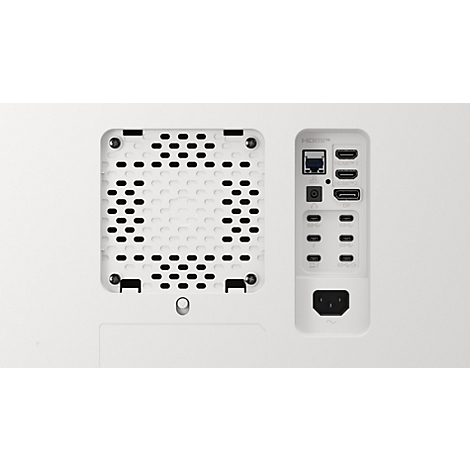 Vue arrière d'un appareil blanc avec une grille de ventilation et divers ports.