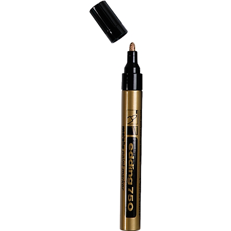 A gold-colored Edding 750 marker with its black cap open next to it.