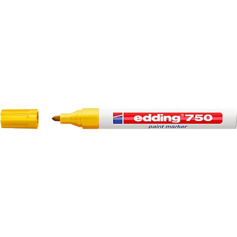 Yellow Edding 750 paint marker, cap next to it. Writing on the marker.