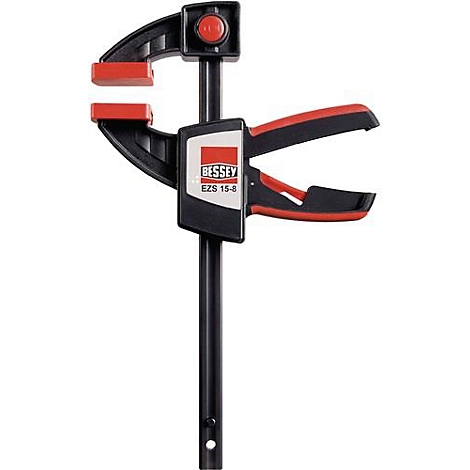 Zwarte lijmklem met rode en zwarte grijpzone. Opdruk 'BESSEY EZS 15-8'.