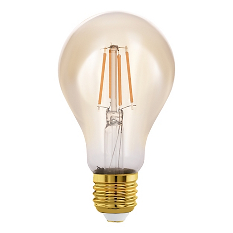 Une ampoule LED vintage sur fond blanc. L'ampoule a une forme en poire avec une base dorée.