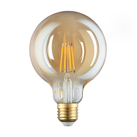 Une ampoule avec du verre clair et un abat-jour jaune-or, de bas en haut avec une base dorée.