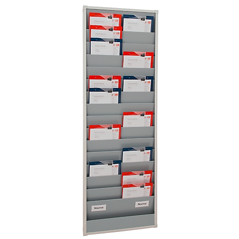 Grey wall letterbox with red and blue documents. Label "Name".