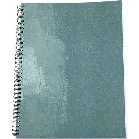 A blue-green notebook with spiral binding lies open. The surface has a slight texture.
