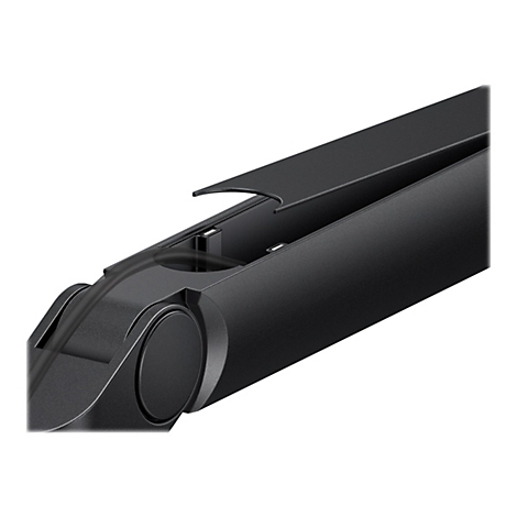 Nahaufnahme eines schwarzen, länglichen Objekts mit einer Öffnung, in der ein Kabel verläuft. Der Deckel ist geöffnet.