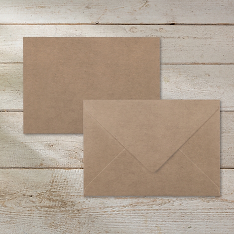 Two brown envelopes against a light wood background. The lower envelope is open.