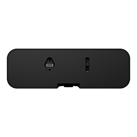 Nahaufnahme der Rückseite eines schwarzen, rechteckigen Geräts. Es weist abgerundete Ecken und eine USB-C-Buchse auf, sowie eine Taste mit Schloss-Symbol.
