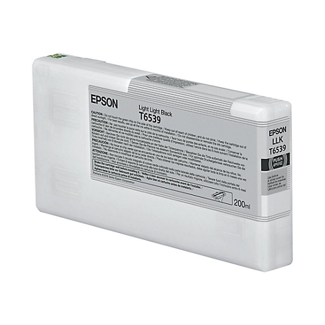 Eine weiße Epson Tintenpatrone, Modell T6539, mit Text und Warnhinweisen aufgedruckt. Auf der Patrone ist ein roter Push-Knopf zu sehen.