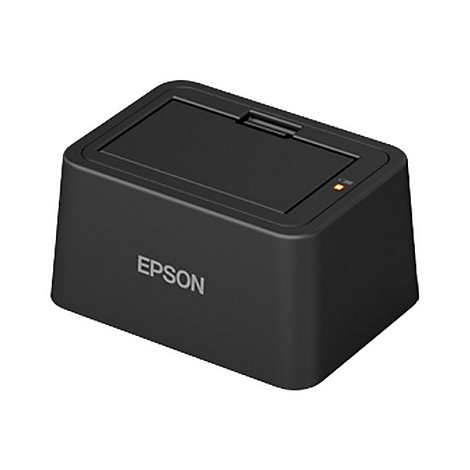 Station de recharge Epson noir. Un renfoncement sombre sur le dessus, le mot "EPSON" sur le devant, petite LED jaune.