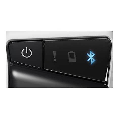Gros plan sur une surface de panneau de contrôle noire avec bouton d'alimentation, symbole d'avertissement, symbole de batterie et symbole Bluetooth bleu.