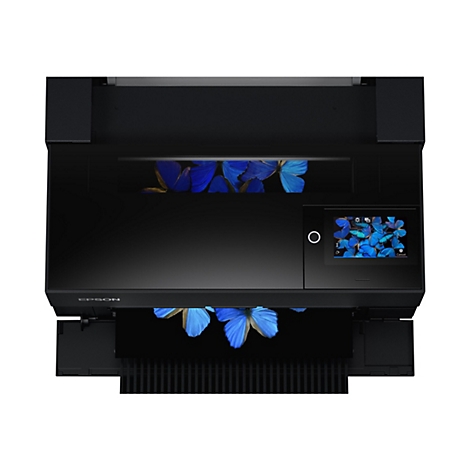 Imprimante noire avec écran tactile. Des papillons bleus sont visibles sur l'écran et sur l'impression. Le logo Epson est visible.