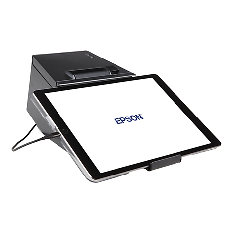 Ein schwarzes Tablet, das auf einem schwarzen Ständer steht. Auf dem Bildschirm ist das Epson-Logo zu sehen, verbunden mit einem Ladekabel.