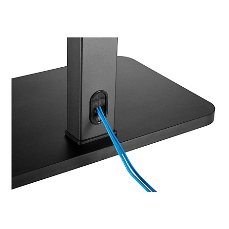 Detailaufnahme eines schwarzen Tischfußes mit blauen Kabeln, die aus einer Öffnung kommen.