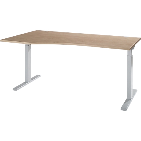 An adjustable desk with a light brown tabletop and grey-white legs. The table has an ergonomic shape.