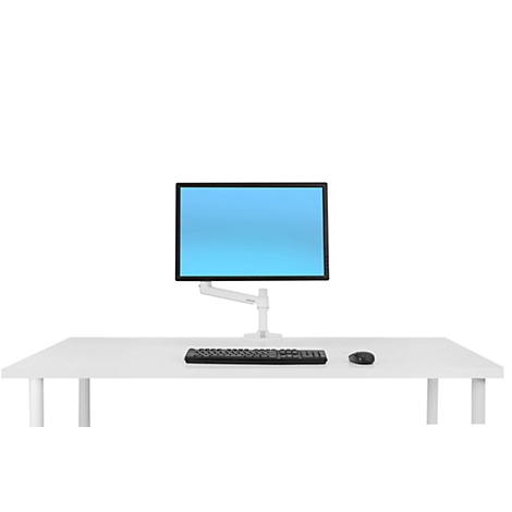 Desk with monitor on bracket, keyboard and mouse.