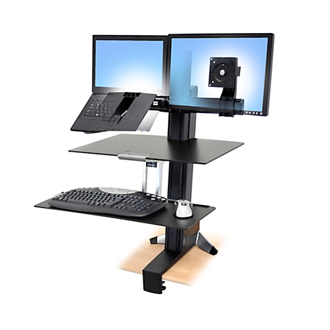 Desk with two monitors, keyboard, and mouse.