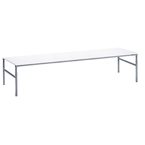 A long, white table with metal legs against a white background.