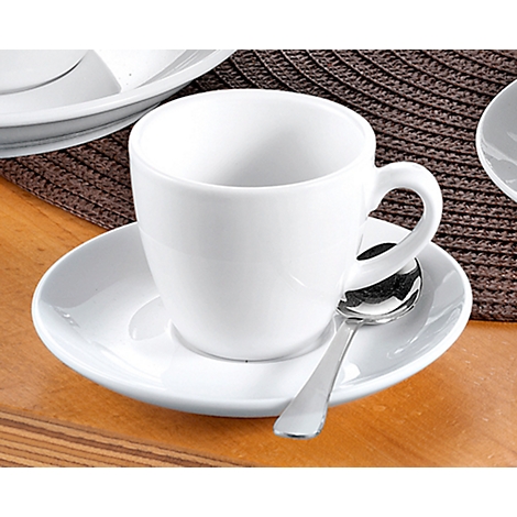 White coffee cup with saucer and spoon, on a table.
