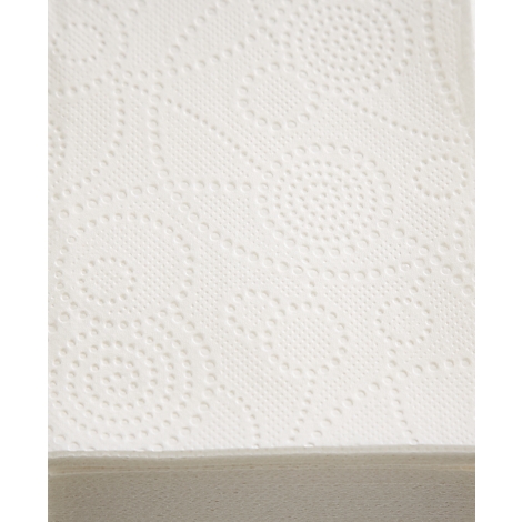 Gros plan sur du papier essuie-tout blanc avec des motifs en relief, en dessous un bord gris.