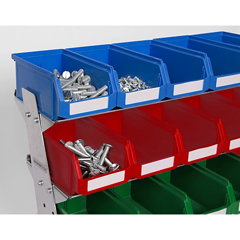 Contenedores azules, rojos y verdes llenos de tornillos. Los contenedores están dispuestos en un marco de metal.