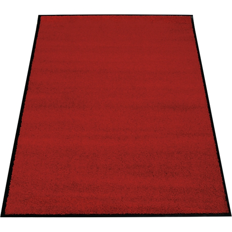 Alfombra roja con borde negro. La superficie tiene un aspecto texturizado.