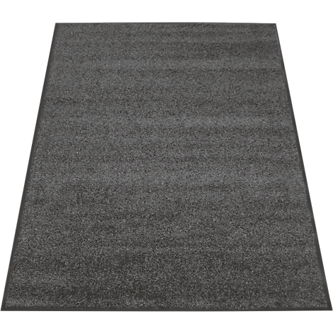 Alfombra gris sobre fondo claro. Rectangular, con borde oscuro.