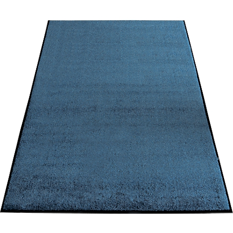 Alfombra rectangular azul con borde negro, mostrada ligeramente inclinada.