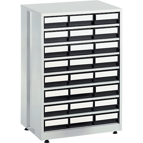 Armoire grise avec de nombreux tiroirs, chacun avec une étiquette blanche.