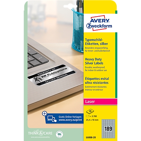 Ordinateur portable gris avec une étiquette argentée et un panneau jaune. Avery Zweckform.