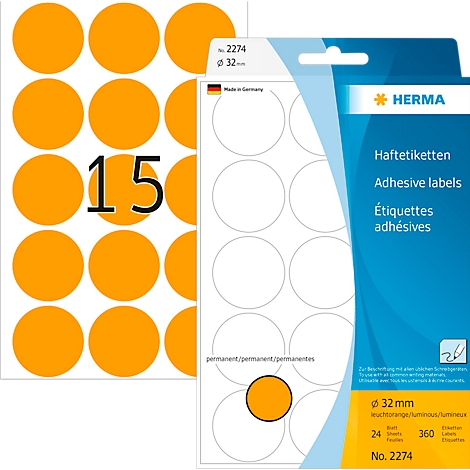 Autocollants orange avec le numéro "15", à côté d'un paquet d'étiquettes blanches.