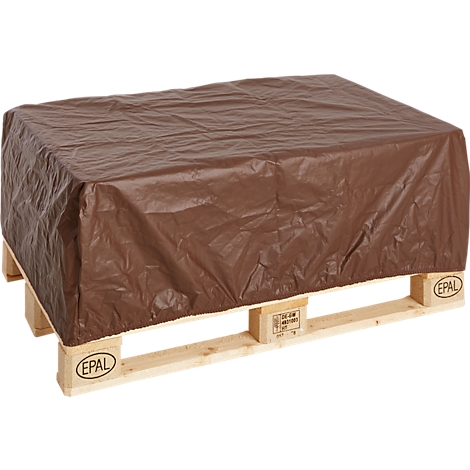 A brown cover rests on a wooden pallet. The protective material is crumpled, and the wooden beams of the pallet are visible underneath.