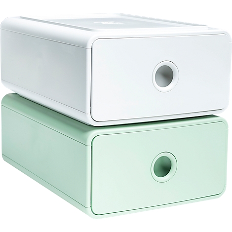 Deux tiroirs empilables en blanc et vert menthe. Chaque tiroir a une ouverture ronde.