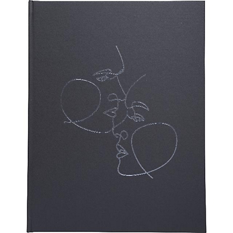 Schwarzes Notizbuch mit silberner Linienzeichnung zweier Gesichter. Auf der linken Seite ein grosser Kreis.