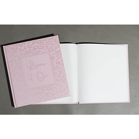 Hellrosa Buch mit floralem Muster und Schriftzug 'Livre d'Or'. Das Buch ist aufgeschlagen und zeigt leere, weiße Seiten.