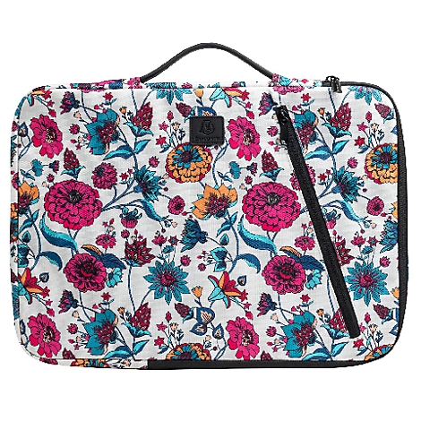 Motif floral sur un sac. Fleurs roses, bleues, jaunes sur fond blanc. Fermeture éclair noire, poignée.