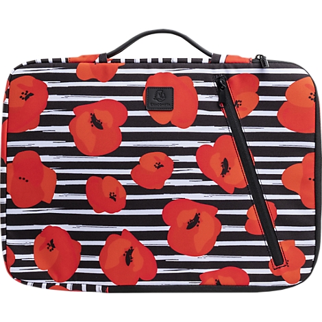Sac noir à rayures blanches et coquelicots rouges. Fermeture éclair et poignée noires. Étiquette au milieu.
