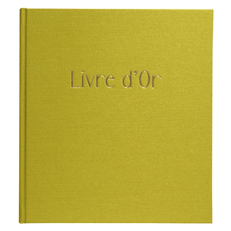 Livre jaune-vert avec le titre embossé "Livre d'Or".