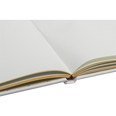 Carnet ouvert avec des pages blanches, des bords de pages jaunes et une reliure blanche.