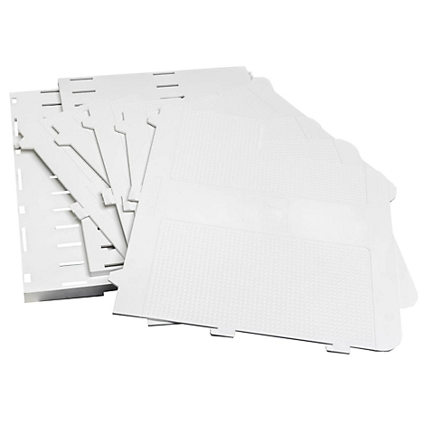 Diverses plaques et éléments en plastique blanc qui s'emboîtent.