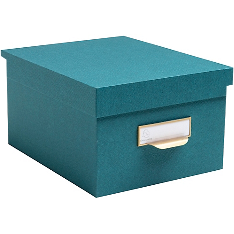 Une boîte de rangement turquoise avec un couvercle et une plaque signalétique.