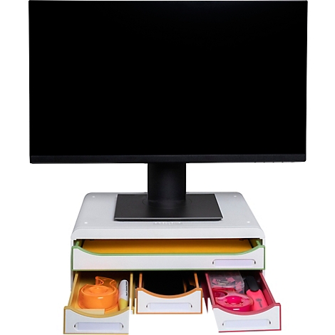 Monitor mit Ständer und Schubladen in Weiß, Gelb und Grün. Darin: Stifte, Klebeband und anderes Bürobedarf.
