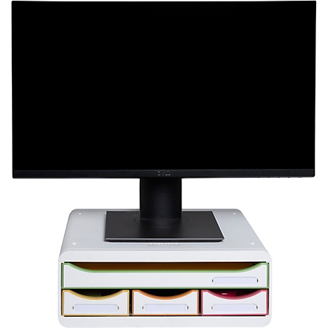 Ein Monitor steht auf einem weißen Ständer mit Schubladen in verschiedenen Farben. Der Bildschirm ist schwarz.